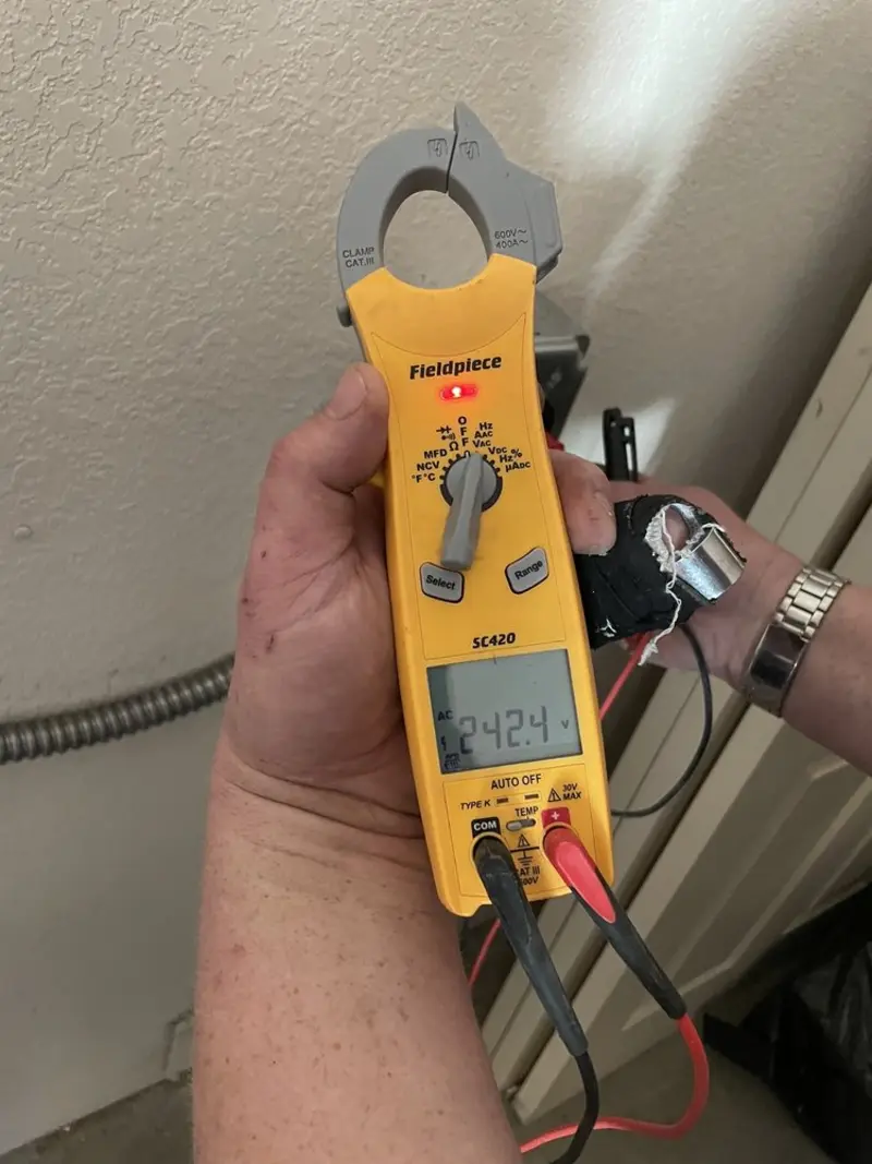 Voltage testing with clamp meter during Generator Installation in Norco